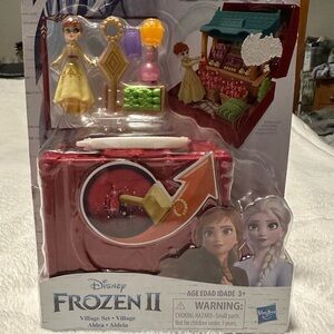 Disney Frozen II Mini Village Playset with Yellow Anna Doll and Red Carry Case